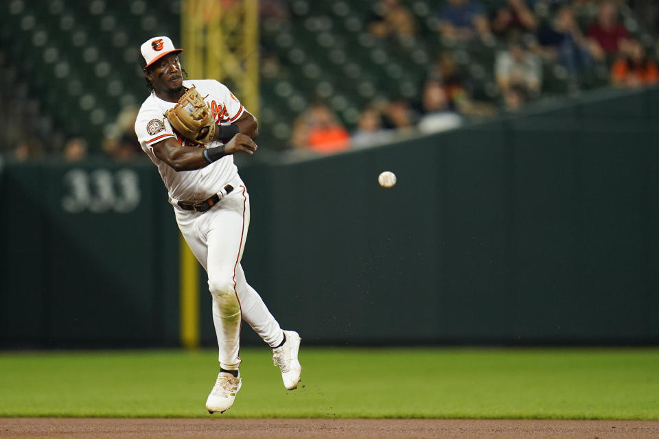 Baltimore Orioles shortstop Jorge Mateo throws to second base to force out Chicago White Sox's Elvis Andrus on a ball hit by Josh Harrison during the seventh inning of a baseball game, Thursday, Aug. 25, 2022, in Baltimore. (AP Photo/Julio Cortez)