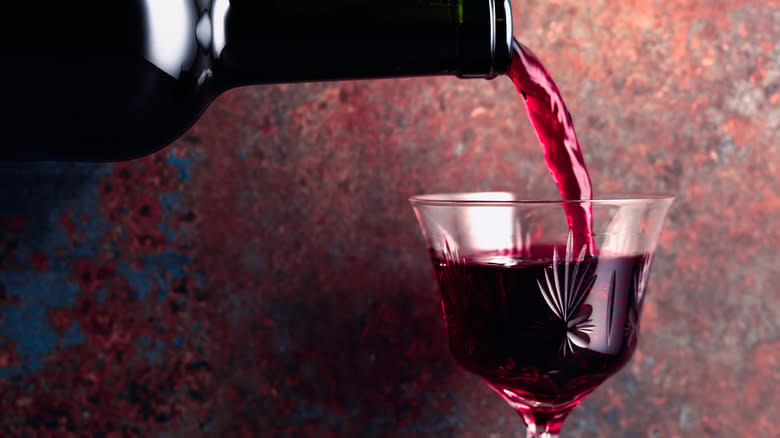 Port wine being poured into a glass