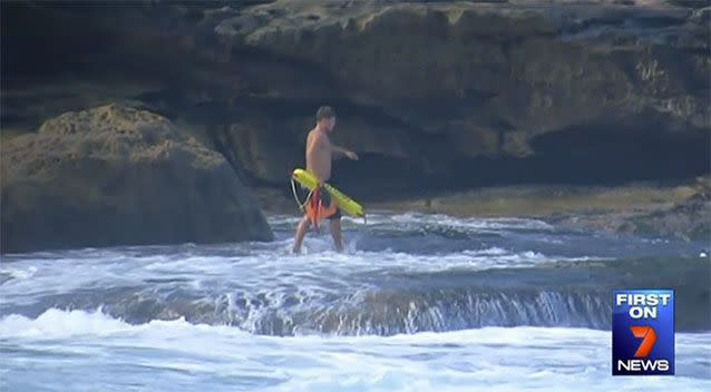 Lifeguard Harrison Reid took to the waters to save the woman. Source: 7 News