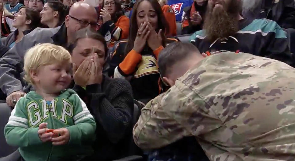 Sgt. Robert Munoz, a huge fan of the Ducks, hadn't seen his family in nearly a year before their reunion at the Honda Center on Saturday night. (Twitter//@AnaheimDucks)