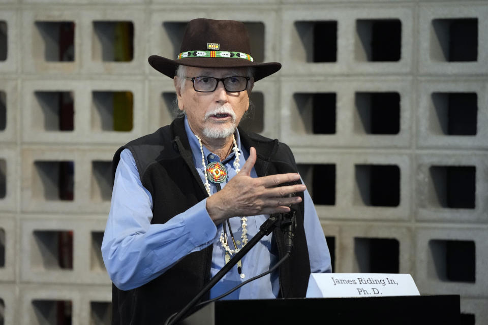 Dr. James Riding In speaks during a news conference by Native American advocacy groups, Thursday, Feb. 9, 2023, in Phoenix. The groups are calling for the NFL football team Kansas City Chiefs to drop their name, logo and their trademark “war chant” where fans make a chopping-hand gesture mimicking the Native American tomahawk. They play to demonstrate outside State Farm Stadium in the Phoenix suburb of Glendale during the Super Bowl 57 NFL football game. (AP Photo/Rick Scuteri)