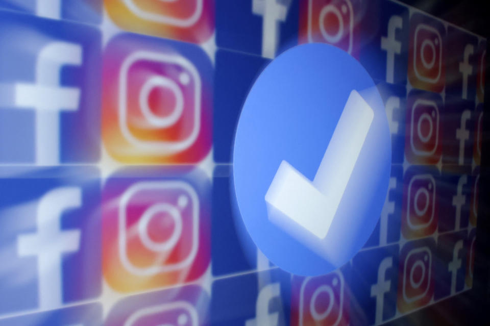 A blue verification badge and the logos of Facebook and Instagram are seen in this picture illustration taken January 19, 2023. REUTERS/Dado Ruvic/Illustration