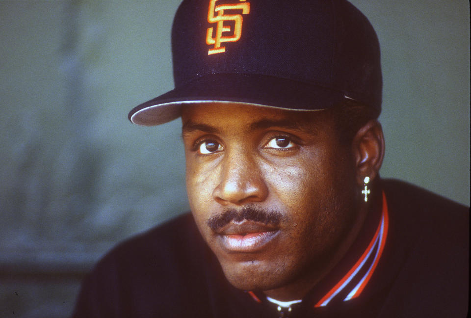 SAN FRANCISCO, CA - CIRCA 1993: Barry Bonds #25 of the San Francisco Giants looks on from the dugout prior to the start of Major League Baseball game circa 1993 at Candlestick Park in San Francisco, California. Bonds played for the Giants from 1993-2007. (Photo by Focus on Sport/Getty Images)