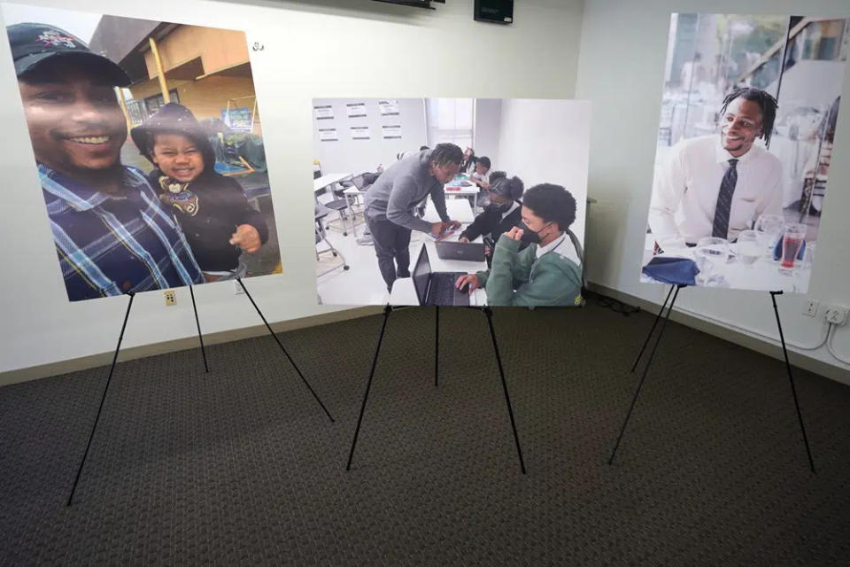 Pictures of 31-year-old teacher, Keenan Anderson, who was tasered multiple times during a struggle with LAPD officers in Venice and died at a hospital, are displayed at news conference to announce filing a $50 million in damages claim against the city of Los Angeles over his death in Los Angeles Friday, Jan. 20, 2023. (AP Photo/Damian Dovarganes)