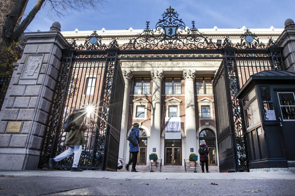 People enter the main gate to Barnard College, in New York's Upper West Side, Thursday, Dec. 12, 2019. An 18-year-old Barnard College freshman, identified as Tessa Majors, has been fatally stabbed during an armed robbery in nearby Morningside Park, sending shock waves through the college and wider Columbia University community. (AP Photo/Richard Drew)