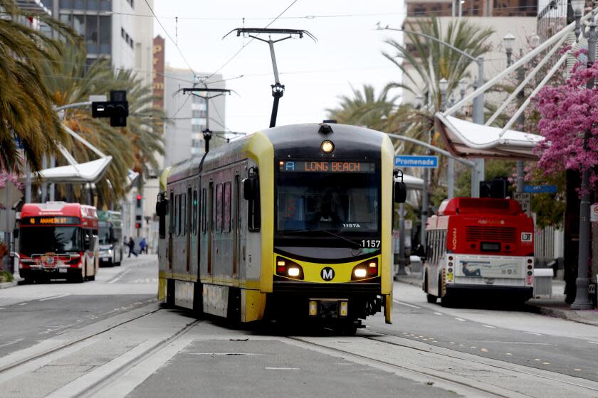 LONG BEACH, CA - APRIL 13: A metro car pulls into the Blue Line Metro 1st Street station in downtown on Thursday, April 13, 2023 in Long Beach, CA. People using the Blue Line Metro station where a man was stabbed to death on April 12th at the 1st Street station around 3:38 p.m. (Gary Coronado / Los Angeles Times)