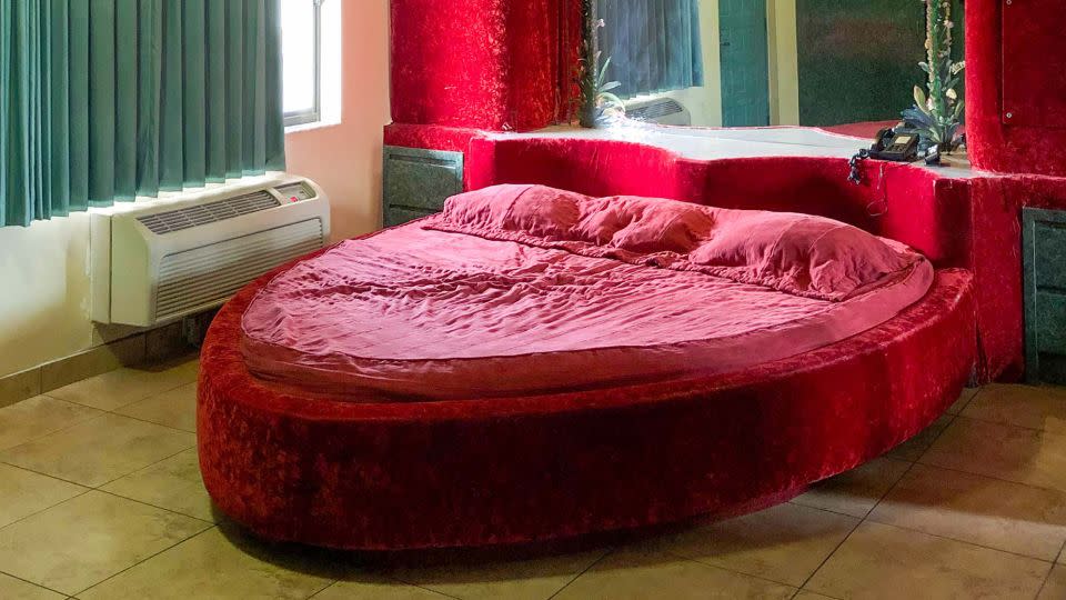 A heart-shaped bed at the Miami Princess Hotel in Miami, Florida. - Margaret and Corey Bienert/Courtesy Artisan Books