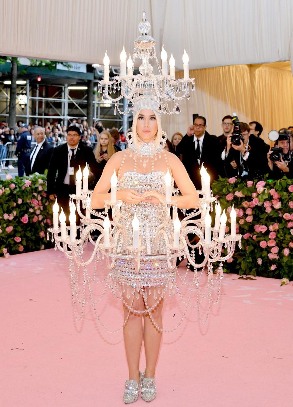 <p> The best Met Gala looks are always surprising as there's no telling how celebs will interpret the theme - and we'll never forget this one from singer Katy Perry. </p> <p> For the 2019 Met Gala, where the theme was Camp: Notes on Fashion, Perry wore a mesmerising chandelier gown that had three tiers of working lights. The iconic dress was designed by Jeremy Scott who created the dress along with his team and hand-placed thousands of Swarovski crystals on the gown. </p>
