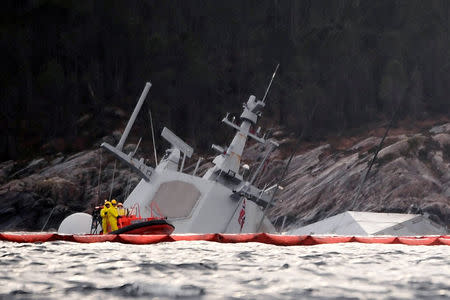 The Norwegian frigate "KNM Helge Ingstad" is seen partly under water in the sea near Bergen, western Norway, November 13, 2018. NTB Scanpix/Marit Hommedal/via REUTERS ATTENTION EDITORS - THIS IMAGE WAS PROVIDED BY A THIRD PARTY. NORWAY OUT. NO COMMERCIAL OR EDITORIAL SALES IN NORWAY.