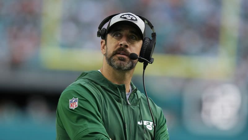 New York Jets quarterback Aaron Rodgers looks up during the second half of an NFL football game against the Miami Dolphins, Sunday, Dec. 17, 2023, in Miami Gardens, Fla.