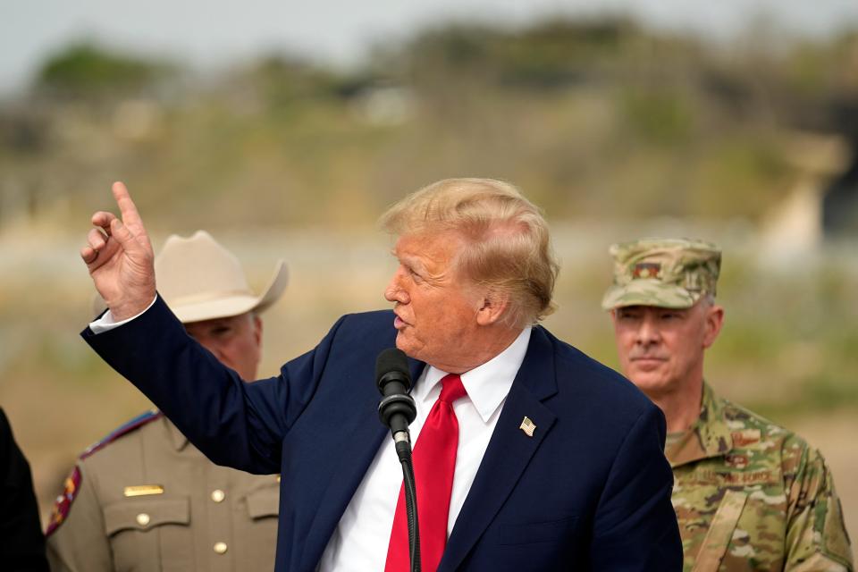 Former President Donald Trump, who is running for reelection, points to Mexico during a visit to the U.S.-Mexico border, Thursday.