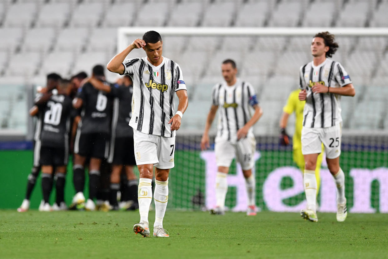 Juventus and Cristiano Ronaldo (foreground) are out of the UEFA Champions League after losing on away goals to French side Lyon in the round of 16. (Valerio Pennicino/Getty Images)