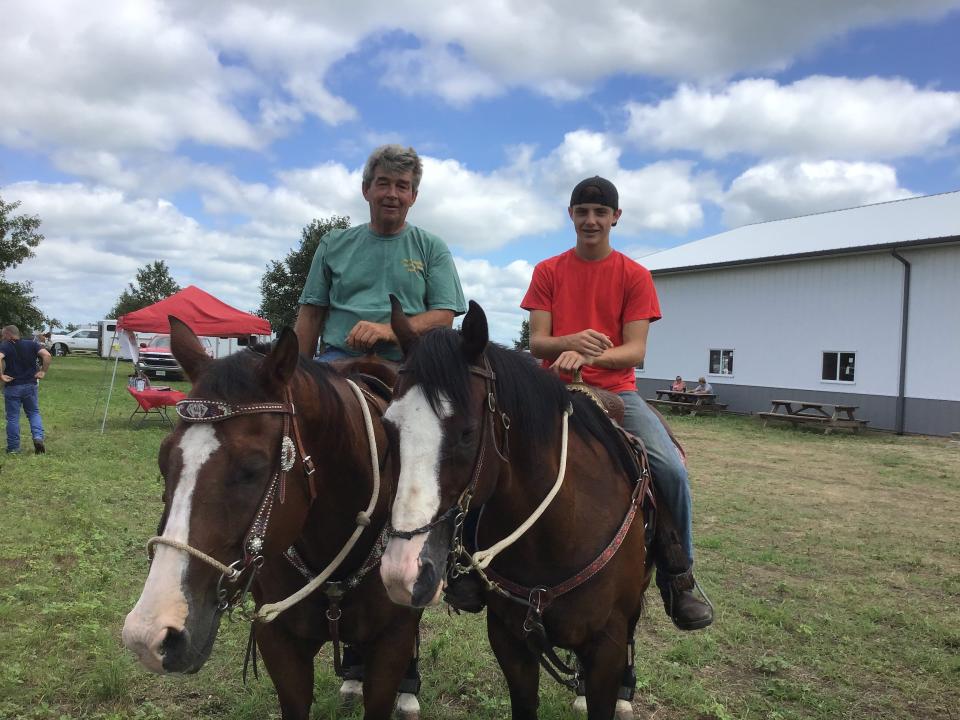 Canton High School football player Gavin Otto (on right) with his uncle, Chris Trone.