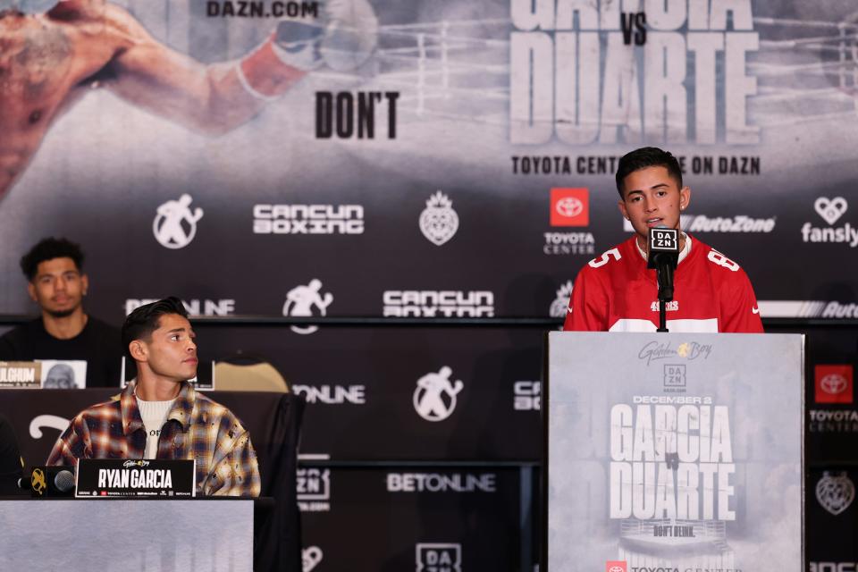 Sean Garcia, right, speaks during a press conference in Houston on Thursday afternoon as his brother Ryan Garcia looks on. The Garcia brothers will both be in action at the Toyota Center, in Houston, on Dec. 2.