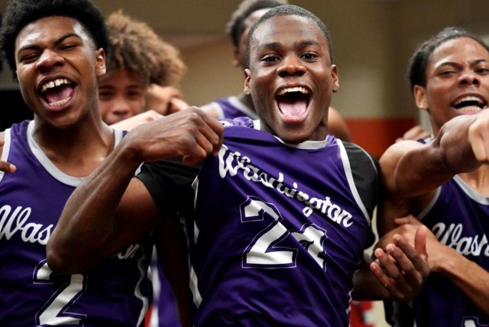 David Leye (24) and his Washington teammates celebrate a come-from-behind sectional semifinal win over Purdue Poly.