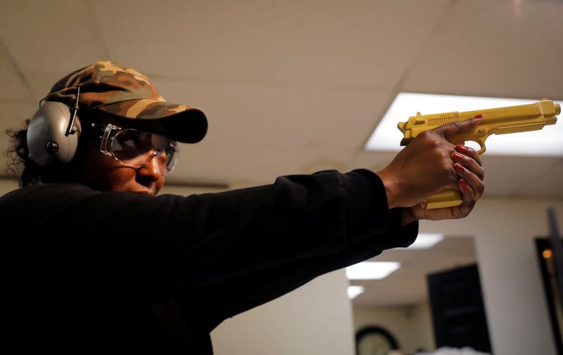 Andreyah Garland, a 44-year-old single mother of three daughters during a gun training session in Newburgh