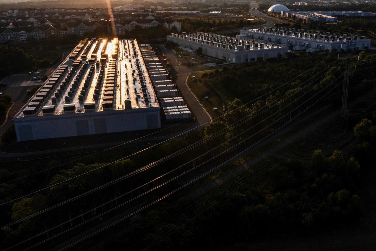 <span>An Amazon Web Services data center in Ashburn, Virginia, on 28 July 2024.</span><span>Photograph: Nathan Howard/Bloomberg via Getty Images</span>