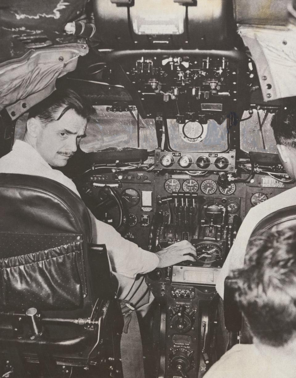 Howard Hughes at the controls of an airplane in 1940.