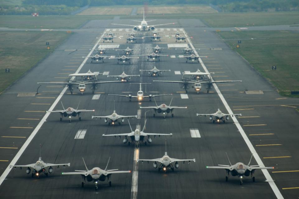 U.S. and Japan Air Self-Defense Force aircraft taxi in an 'Elephant Walk' formation at Misawa Air Base, Japan, May 13, 2022.