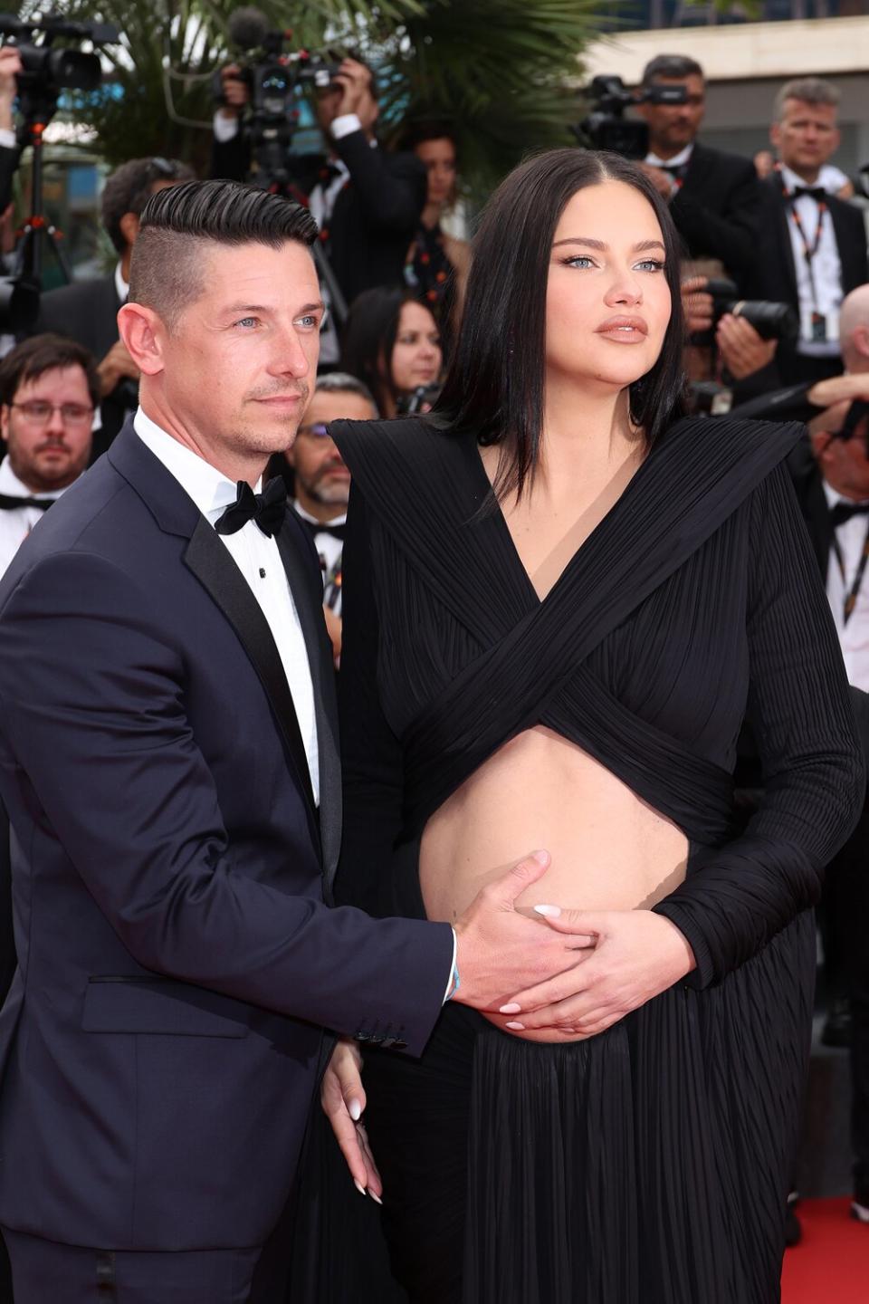 Adriana Lima and Andre Lemmers attend the screening of "Top Gun: Maverick" during the 75th annual Cannes film festival at Palais des Festivals on May 18, 2022 in Cannes, France.