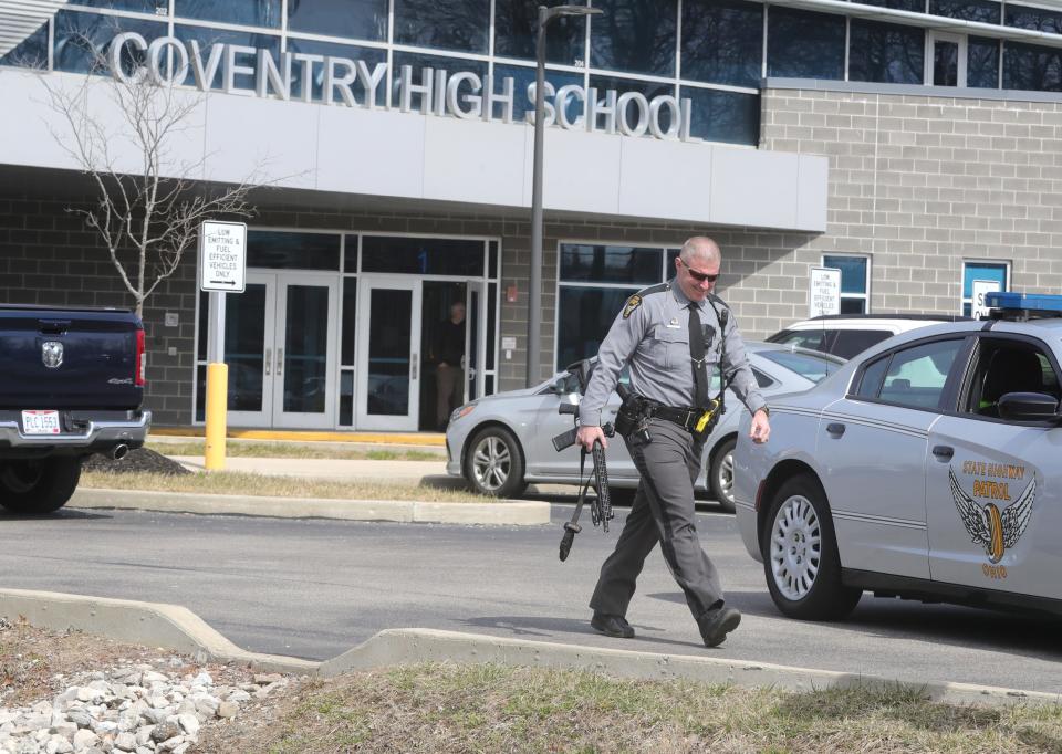 No injuries were reported Tuesday after an apparent hoax caller told authorities that a man had just shot four students and barricaded himself inside Coventry High School.