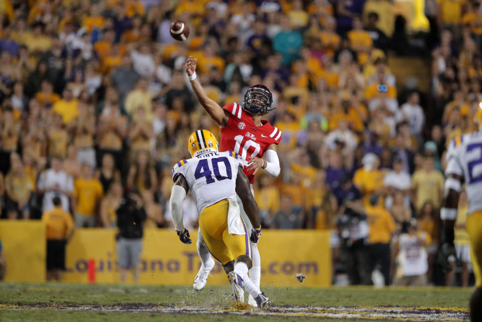 After an All-American season, LSU linebacker Devin White (40) is moving on to the NFL. (AP Photo/Gerald Herbert)