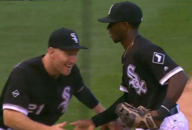 Tim Anderson celebrates starting a triple play with teammate Todd Frazier. (MLB)