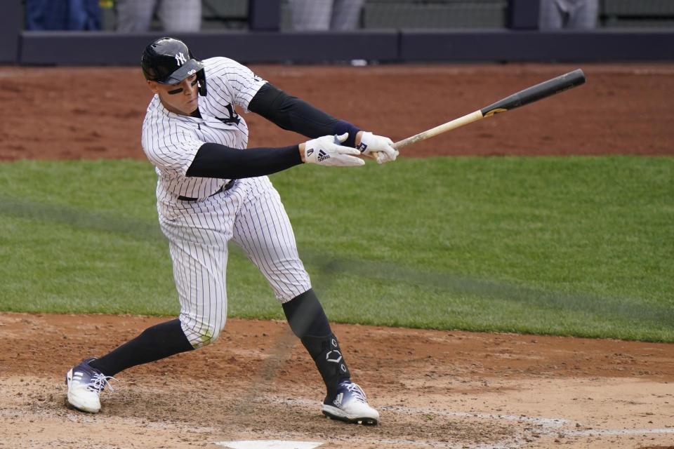 New York Yankees' Aaron Judge strikes out on a pitch from Tampa Bay Rays relief pitcher Ryan Yarbrough during the fifth inning of a baseball game, Sunday, April 18, 2021, at Yankee Stadium in New York. (AP Photo/Kathy Willens)