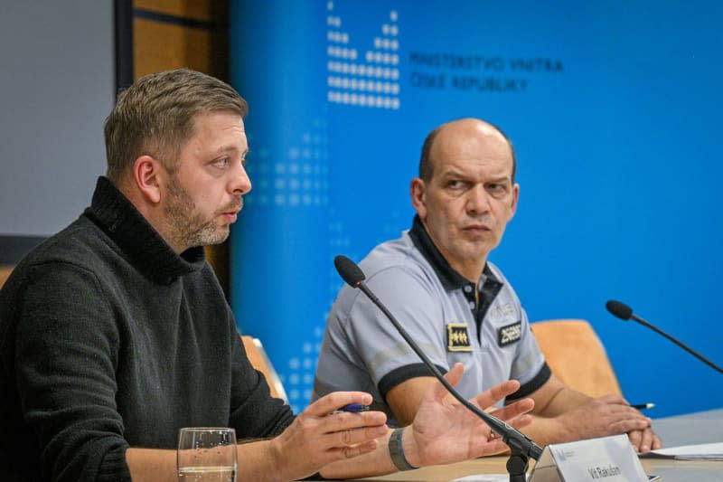 Czech Interior Minister Vit Rakusan (L) and Police President Martin Vondrak speaks during a press conference on the shooting at the Faculty of Arts. Šimánek Vít/CTK/dpa