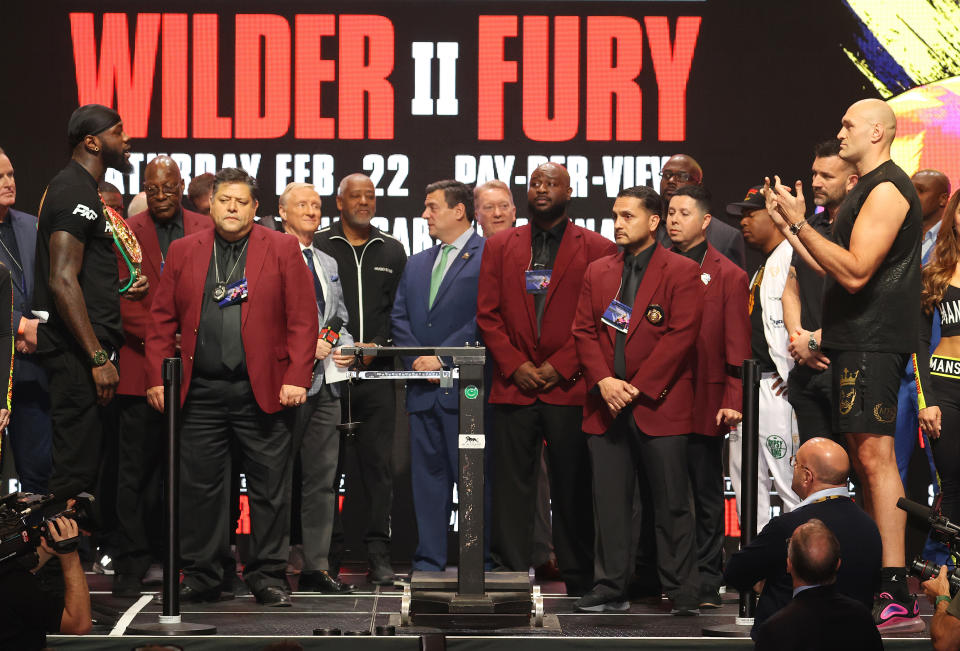 LAS VEGAS, NEVADA - FEBRUARY 21:  Deontay Wilder and Tyson Fury face off during their official weigh-in at MGM Grand Garden Arena on February 21, 2020 in Las Vegas, Nevada.  (Photo by Al Bello/Getty Images)