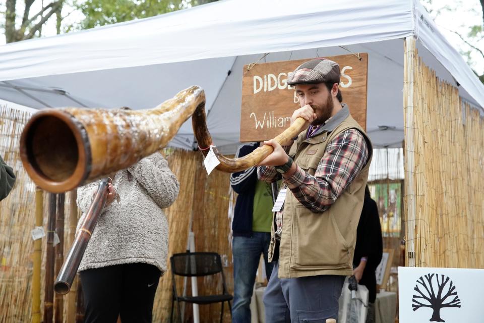 William MacGavin plays a digeridoo at the Kentuck Arts Festival in Northport, Ala. on Saturday, Oct. 12, 2019. [Photo/Jake Arthur]