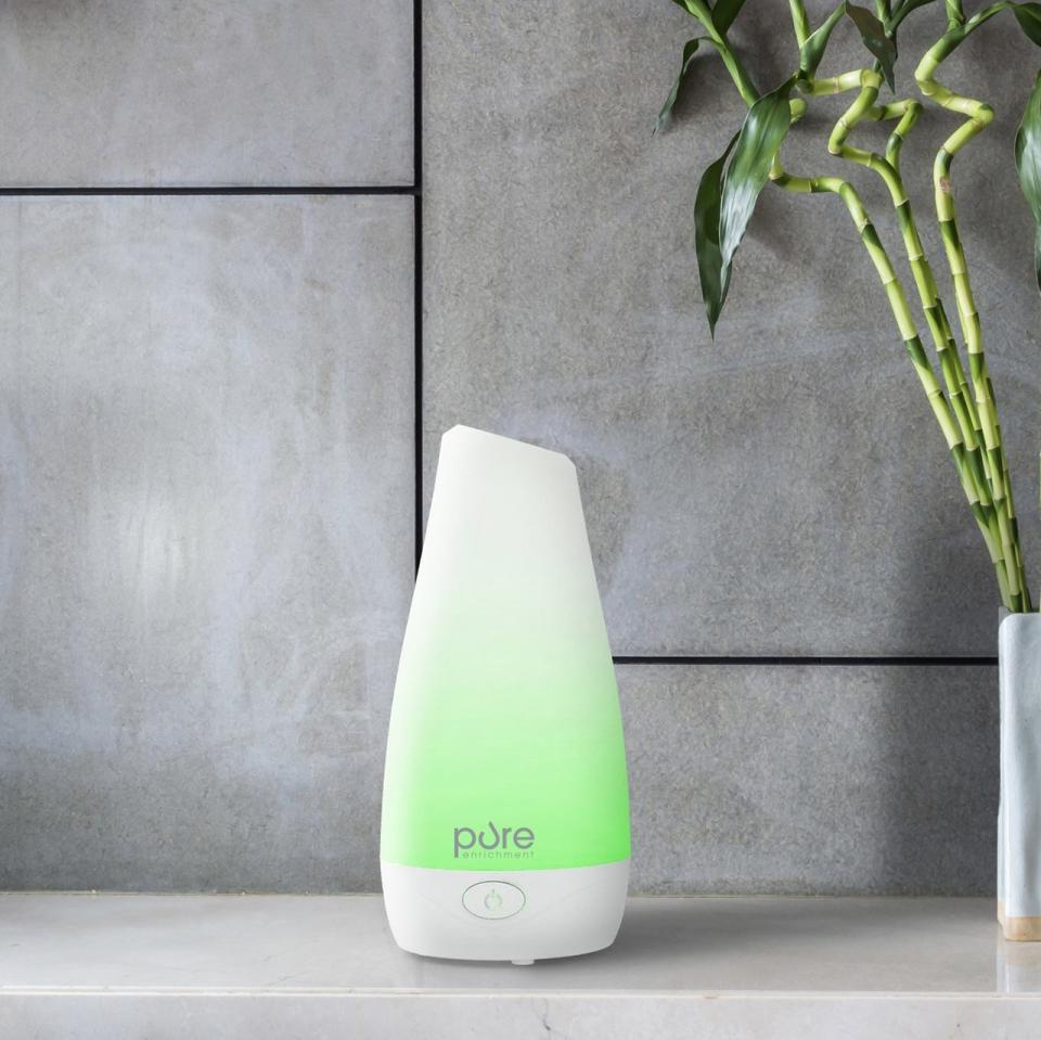 <p><strong>This flashy essential oil diffuser. <a rel="nofollow noopener" href="https://www.amazon.com/PureSpa-Essential-Oil-Diffuser-Color-Changing/dp/B00VKEEY8E?mbid=synd_yahoolife" target="_blank" data-ylk="slk:$29.99;elm:context_link;itc:0;sec:content-canvas" class="link ">$29.99</a></strong></p> <p>It moisturizes and freshens up a room while softly glowing in a soothing color.</p>