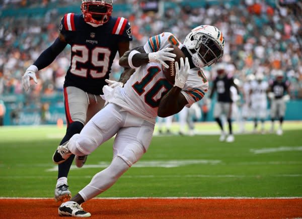 Miami Dolphins wide receiver Tyreek Hill scores a touchdown against the New England Patriots on Sunday at Hard Rock Stadium in Miami Gardens, Fla. Photo by Larry Marano/UPI