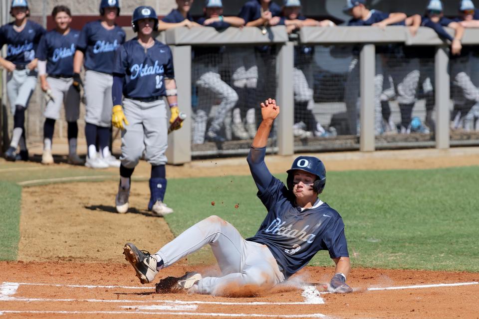 Oktaha's Maddox Edwards slides home to score a run during a Class A state baseball tournament game between Preston and Oktaha at Edmond Edmond Memorial, Thursday, Oct. 5, 2023.