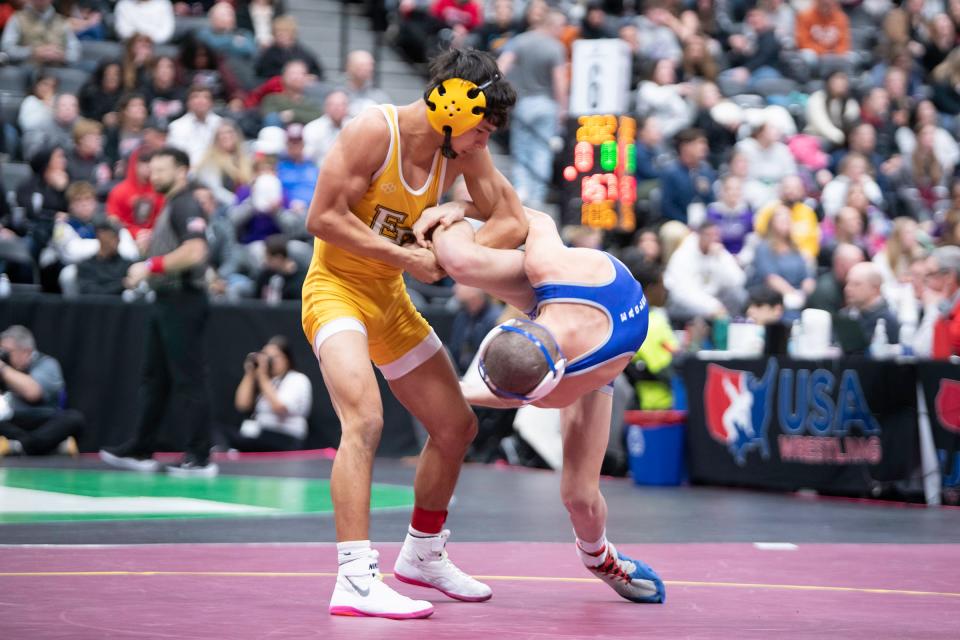 Pueblo East's Manuel "Pocky" Amaro takes down August Soto of Broomfield during their Class 4A 106-pound semifinal matchup on day two of the CHSAA state wrestling tournament on Friday, February 16, 2024.