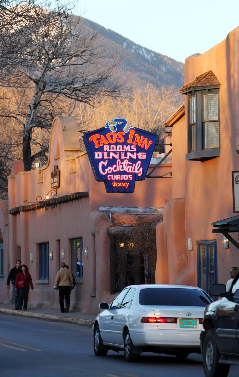 This Feb. 25, 2012 image shows the neon sign in front of the historic Taos Inn along the main street in Taos, N.M. The inn was opened by entrepreneur and artist Helen Martin after the death of her husband in the 1930s. Taos is embarking on a yearlong celebration aimed at recognizing its remarkable women through art exhibits, film screenings, lectures, tours and outdoor excursions. (AP Photo/Susan Montoya Bryan)