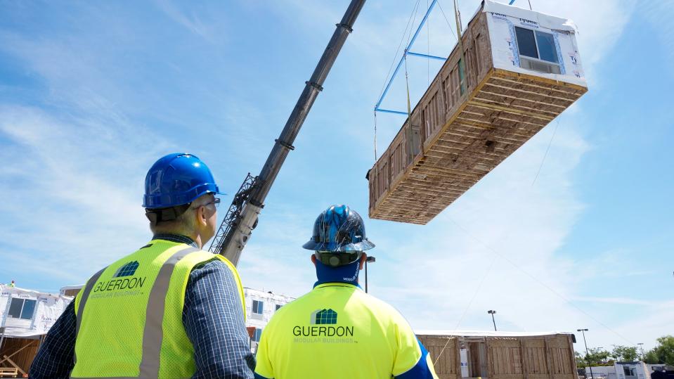 Built section-by-section in a factory, hotel units are shipped to a site and stacked, sometimes practically overnight. Photo credit: Guerdon Modular Buildings.