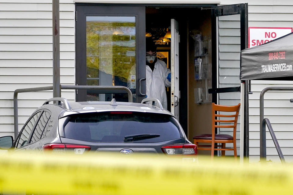 FILE - A hazmat team works inside Schemengees Bar & Grille, one of the sites of a recent mass shooting, Sunday, Oct. 29, 2023, in Lewiston, Maine. A special commission organized to investigate the response to the Lewiston, Maine, mass shooting last year is set to hear testimony from more police on Thursday, Feb. 8, 2024. (AP Photo/Matt York, File)
