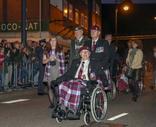 Former paratrooper Sandy Cortmann, front, from Aberdeen, joins the march to The Bridge to Liberation Experience held on the John Frost Bridge in Arnhem, the Netherlands