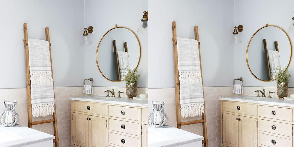 bathroom storage ideas, ladder with towels in the neutral painted bathroom