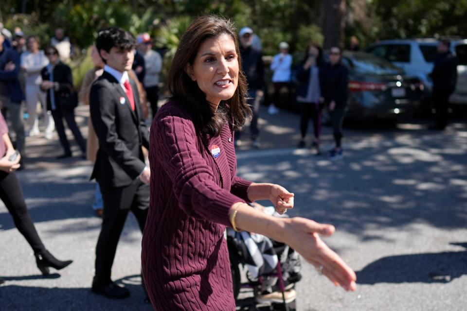 Haley greets a supporter after voting in Kiawah Island, South Carolina (AP)