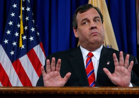 File Photo: New Jersey Governor Chris Christie reacts to a question during a news conference in Trenton, New Jersey, U.S. on March 28, 2014. REUTERS/Eduardo Munoz/File Photo