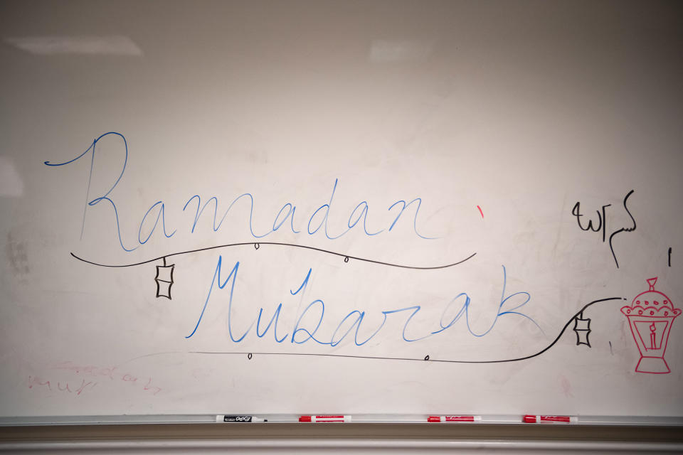 A Ramadan message written on a white board in one of the rooms for children's activities at Dar-al Taqwa Islamic Center.<span class="copyright">Kholood Eid for Time</span>