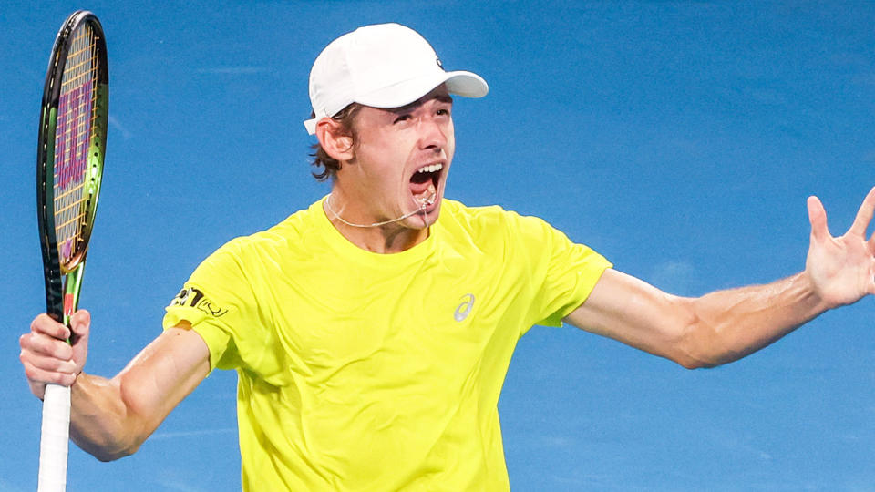 Seen here, Alex de Minaur roars with delight after beating Matteo Berrettini in straight sets at the ATP Cup.