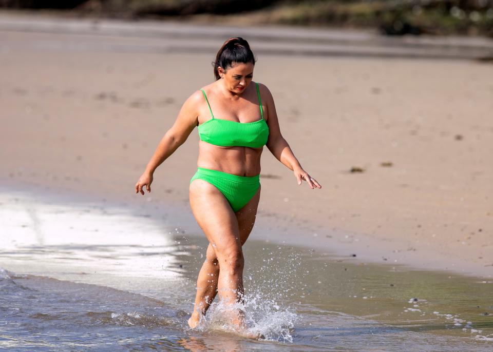 MAFS bride Mishel Meshes cools off in the Sydney heat by taking a dip in a lime green bikini. Photo: DIIMEX.