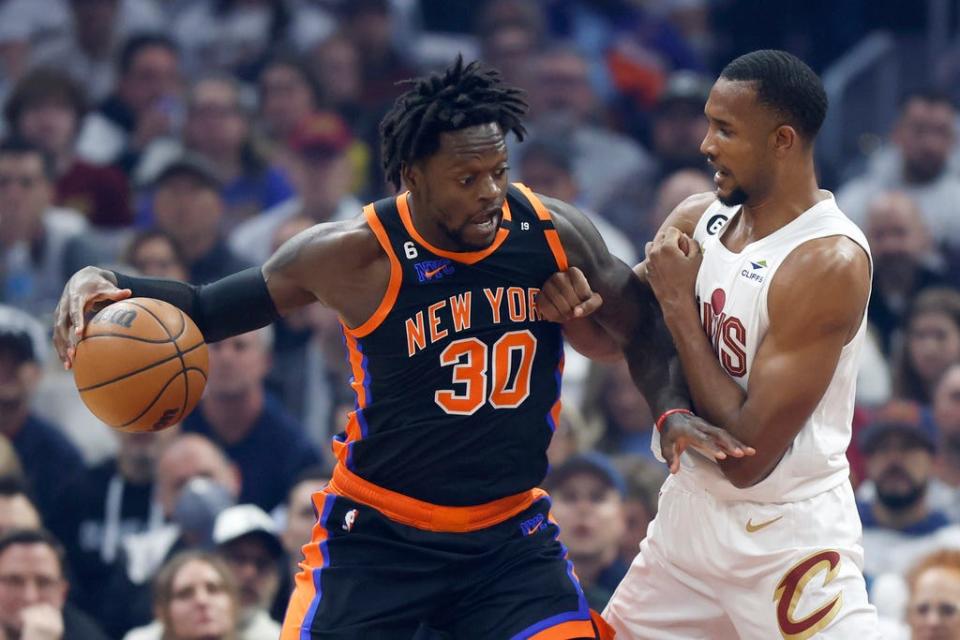 Cavaliers forward Evan Mobley defends Knicks forward Julius Randle during the first half of Game 2 of a first-round playoff series, Tuesday, April 18, 2023, in Cleveland.