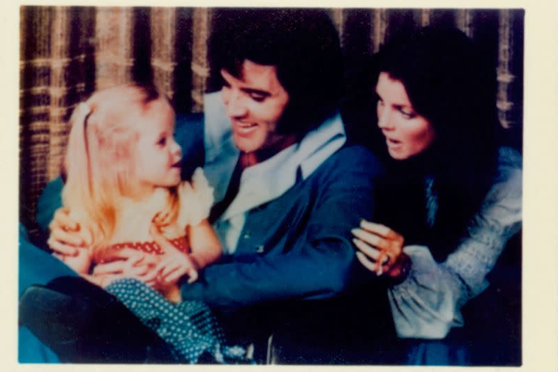 A family photo shows Lisa Marie Presley, Elvis Presley and Priscilla Presley in 1970
