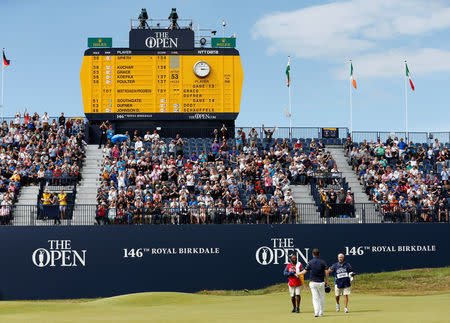 Golf - The 146th Open Championship - Royal Birkdale - Southport, Britain - July 22, 2017 South Africa’s Branden Grace reacts after his par putt on the 18th hole after completing his third round with the lowest ever score in a round in a major championship REUTERS/Andrew Boyers