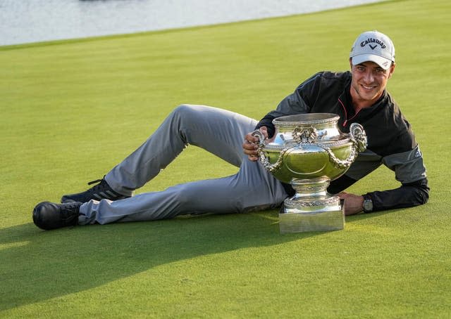 Guido Migliozzi poses with the Open de France trophy