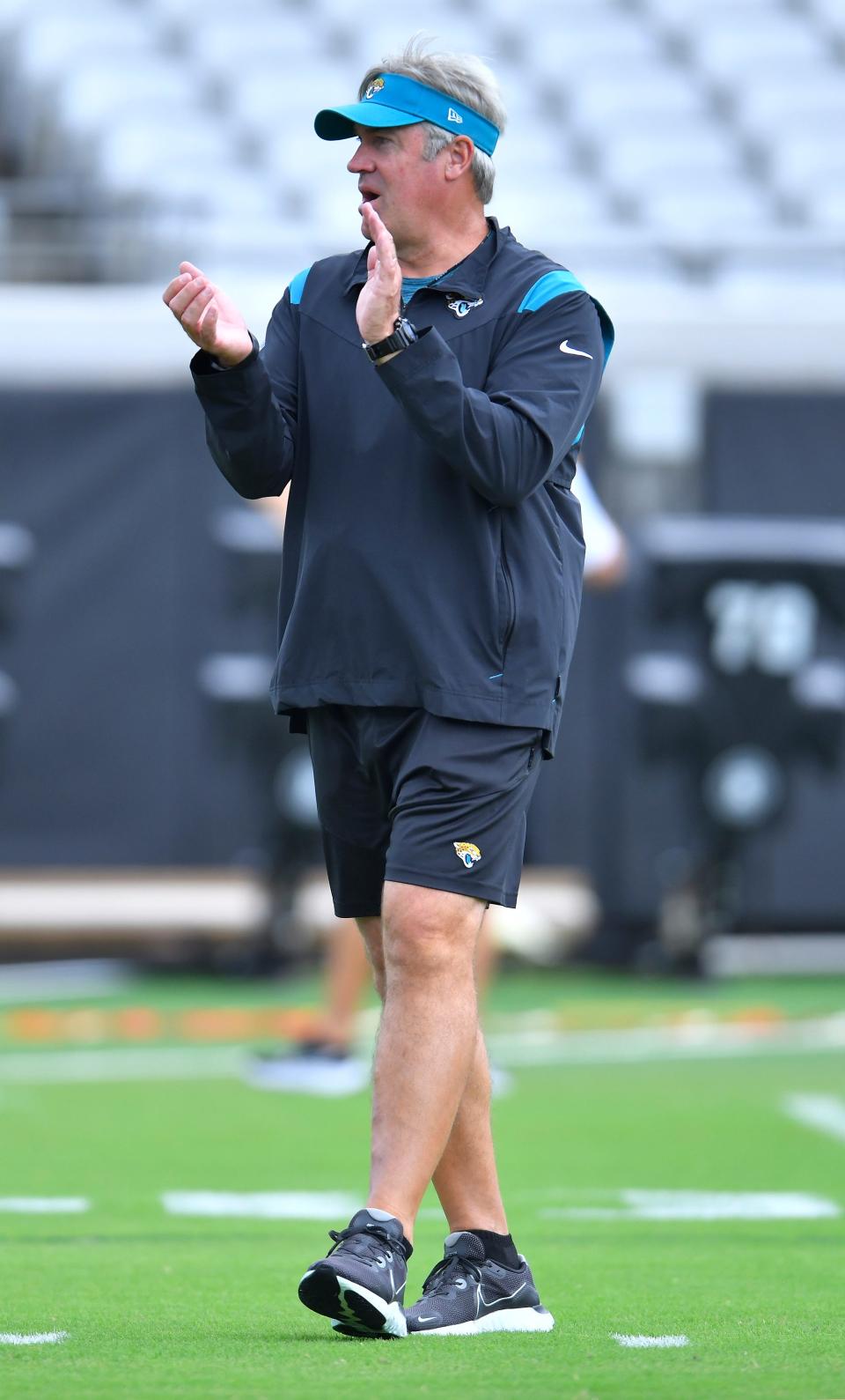 Jaguars head coach Doug Pederson encourages players on Monday during the first OTA practice of the off-season, at TIAA Bank Field.